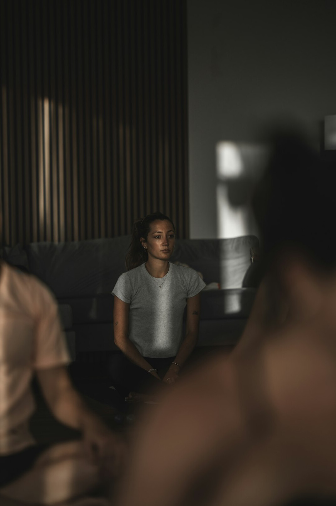 Brazilian people in a warm group conversation in a bright room