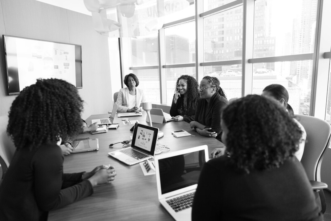 woman leading team meeting