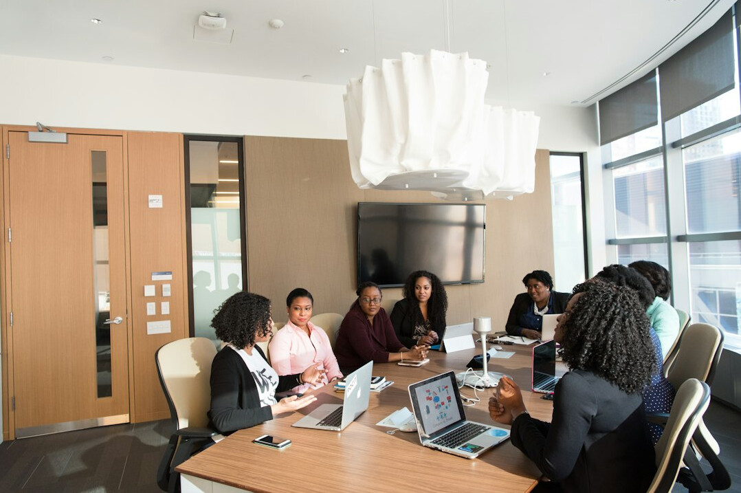 man presenting ideas to group