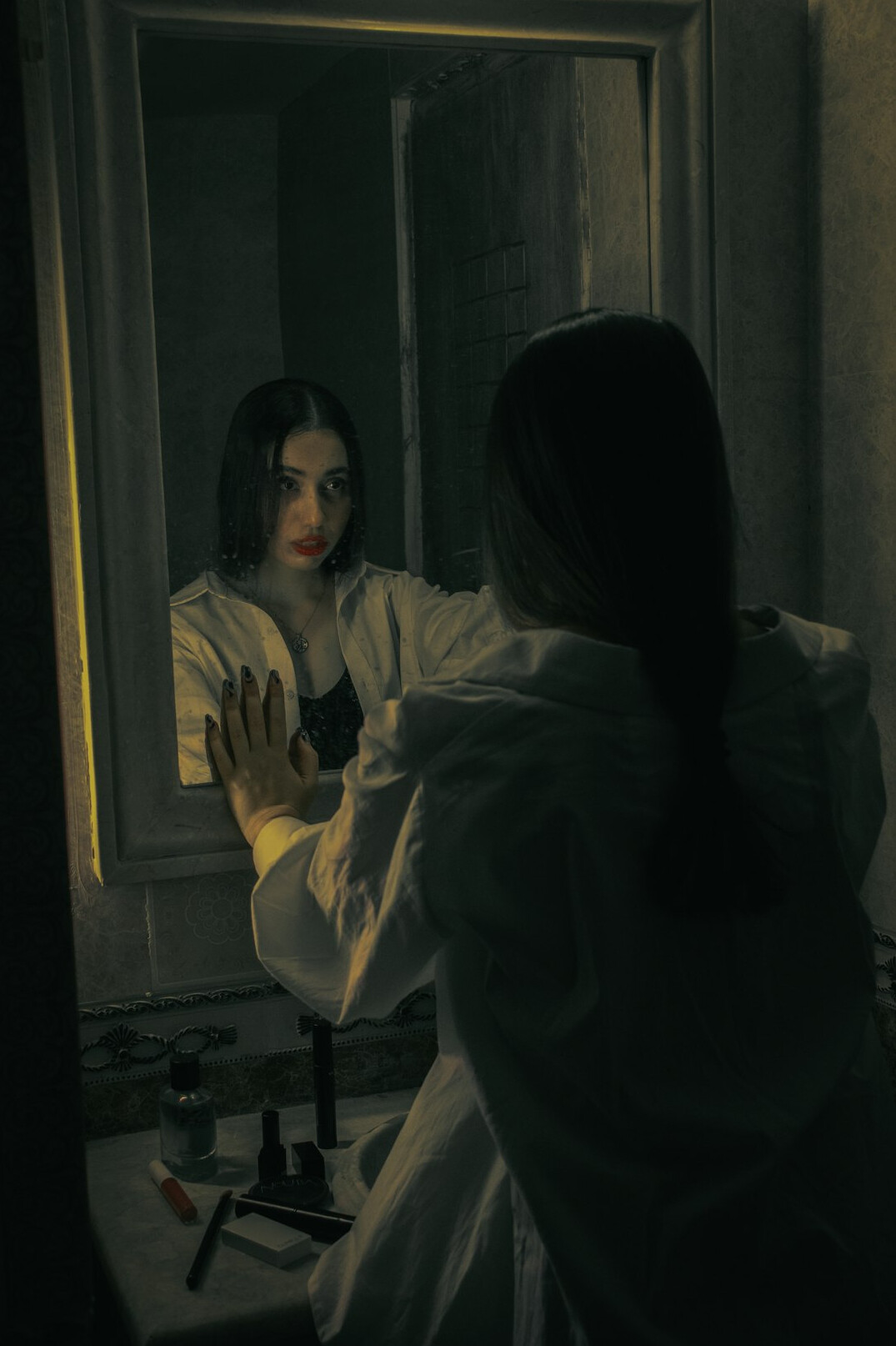 woman practicing speech in front of mirror